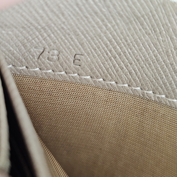 Prada Large Saffiano Zippy Leather Wallet - Picture 15 of 15